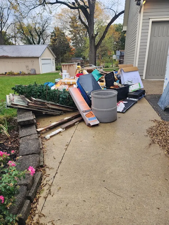 Dumpster being loaded with debris for Commercial Dumpster Rental in Atlantic City